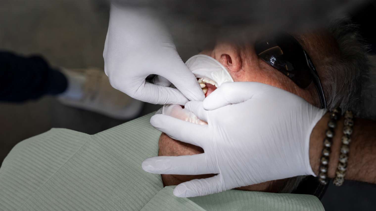 Patient having a dentist perform a proceedure