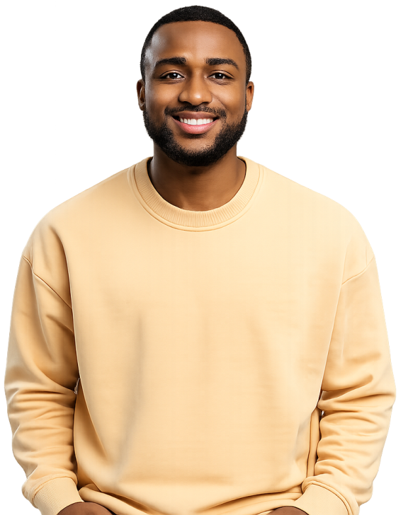 Man smiles wearing a yellow jumper