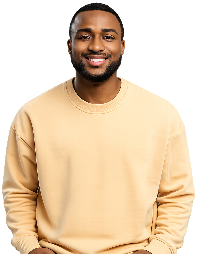 Man smiles wearing a yellow jumper