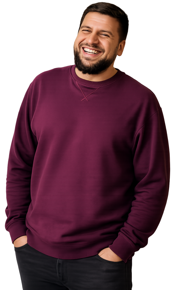 Man smiling with his hands in his pockets