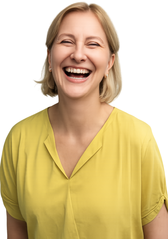 Woman laughing at the camera wearing a yellow shirt